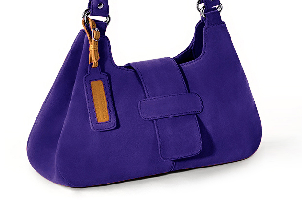 Handcrafted women's luxurious elegant handbag in premium violet purple leather. Perfect for elevated everyday style.   
                Choose from our luxurious collections of leather and fabric to perfectly match your handbags to your outfits.